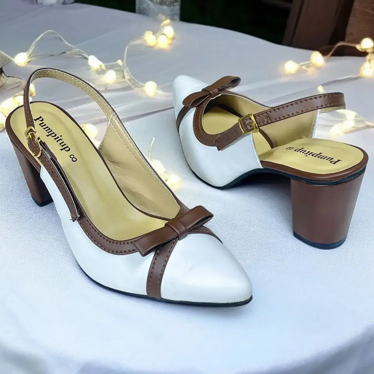 PumpItUp Choco-Vanilla Bow Block Heels PIU_301 with vanilla uppers, chocolate-brown bows, buckle slingback straps and 3-inch block heels.